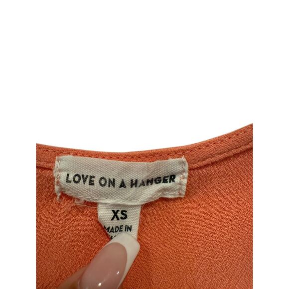 Love on a Hanger Faux Wrap Peplum Coral Top White Floral Detail Extra Small - Picture 3 of 4